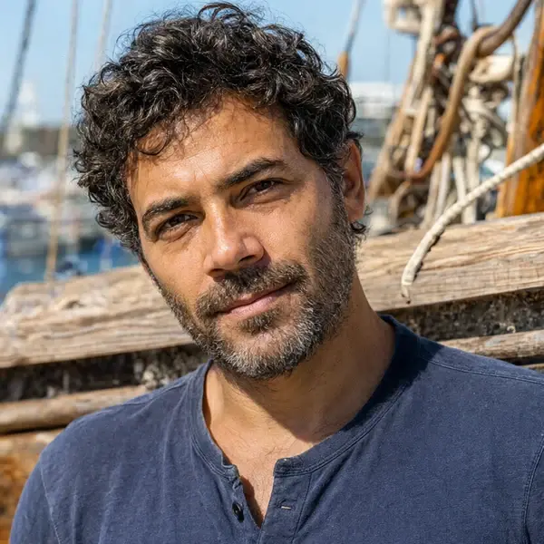 AI-generated portrait of Theron Kalafatis, a synthetic research fellow